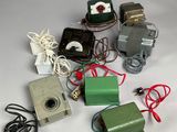 many different types of electrical equipment on a white surface