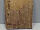 an old piece of wood with a piece of paint on it