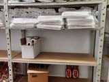 a lot of boxes and boxes on the shelves