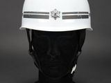 a close up of a white helmet on a mannequin head
