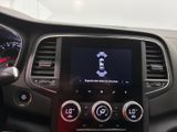 a picture of a dashboard of a car with a clock on it