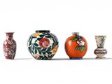 three vases that are sitting next to each other