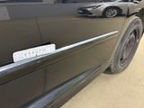 a picture of a car with a sticker on the door