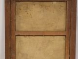 an old wooden picture frame with a brown background and a white background
