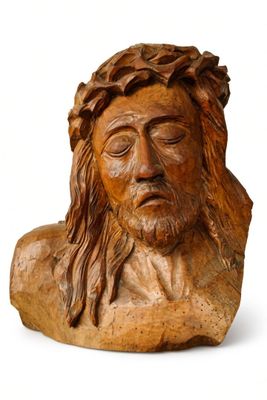 wooden bust of jesus with crown of thorns on his head