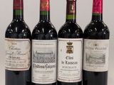 trois bouteilles de vin rouge sont alignées sur une table