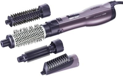three different types of hair brushes and combs on a white background