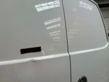 a white van with a sticker on the side of it