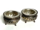 pair of antique silver plated candlesticks with floral design