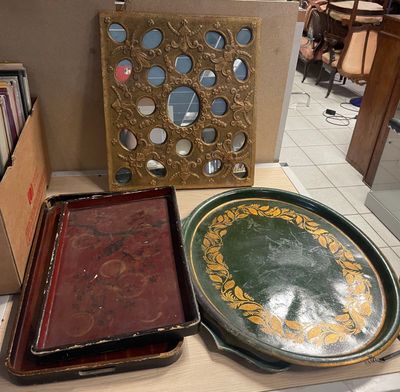 three trays that are sitting on a table