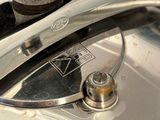 a close up of a metal object on a metal surface
