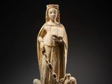 an image of a statue of a woman with a bird on her shoulder