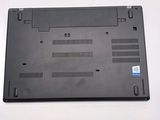 a close up of a laptop on a white surface