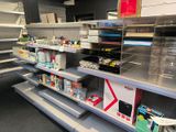 many empty shelves in a store with many items on them