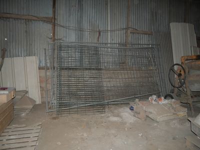 an image of a cage in a building that is under construction