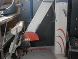 a picture of a machine that is in a garage