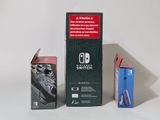 two boxes of nintendo switch and a box of nintendo wii controllers
