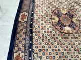 a rug on the floor with a cat laying on top of it