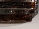 a close up of a piece of glass on a table