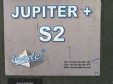 a sign on the side of a building that says jupiter plus s2
