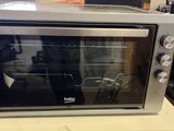 a toaster oven that is sitting on top of a table