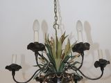 a chandelier hanging from the ceiling in a room