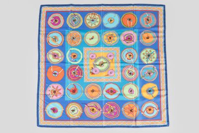 an image of a blue and orange square scarf