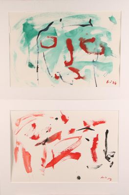 two paintings of red and green paint on a white wall