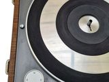 a record player sitting on top of a turntable
