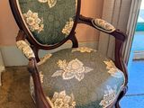 a chair that is sitting in the corner of a room
