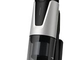 an image of a black and silver vacuum cleaner on a white background