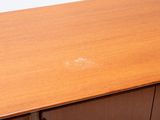 a wooden desk with a drawer underneath it
