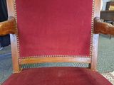 a red chair that is sitting in a room
