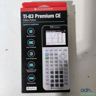 a box with a calculator in it on a table