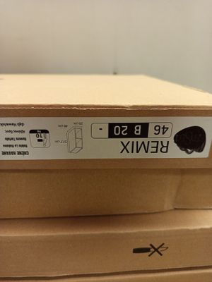 boxes stacked on top of each other on a table in a room