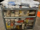 a cart with a lot of food on it in the garage