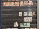 a picture of a display case with stamps on it