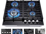 a picture of a gas stove with four burners on it