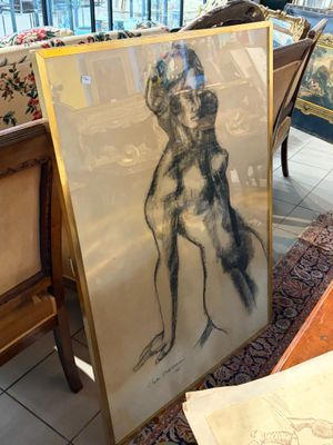une photo représentant un dessin d'un chien posé sur une table