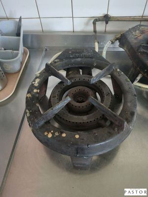 an image of a dirty stove top in a kitchen