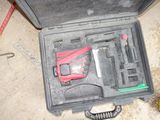 a tool kit in a case on the floor