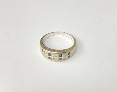 an image of a close up of a ring on a white surface