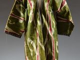an image of a green and red robe on a mannequin