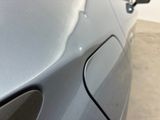 a close up of a car ' s door handle and door handle