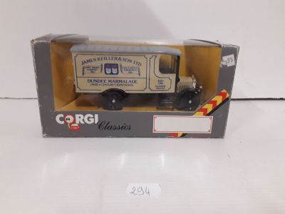 toy truck in box on white surface with white background