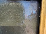 a close up of a window with a glass pane in it