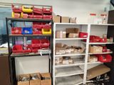 many boxes and boxes on the shelves in the room
