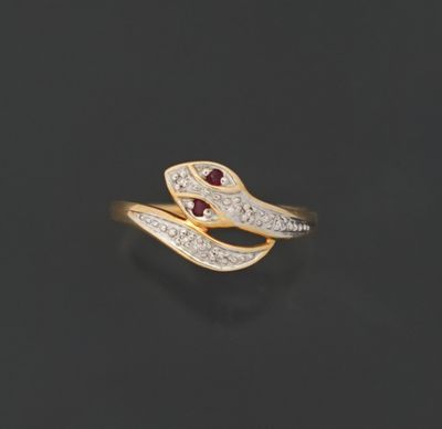 Fine bague serpent en or jaune et gris 18K 750 millièmes pre…