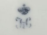 a white plate with a black and white design on it