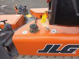 a close up of a tractor with a sign on the back of it